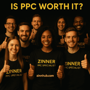 Group Of Diverse Freelancers Wearing Black 'Zinner Ppc Specialist' T-Shirts, All Smiling And Giving Thumbs Up Under The Bold Headline 'Is Ppc Worth It?', Representing Successful Ppc Advertising With Zinn Hub.